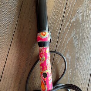 Amika “the auto pilot” rotating curling iron